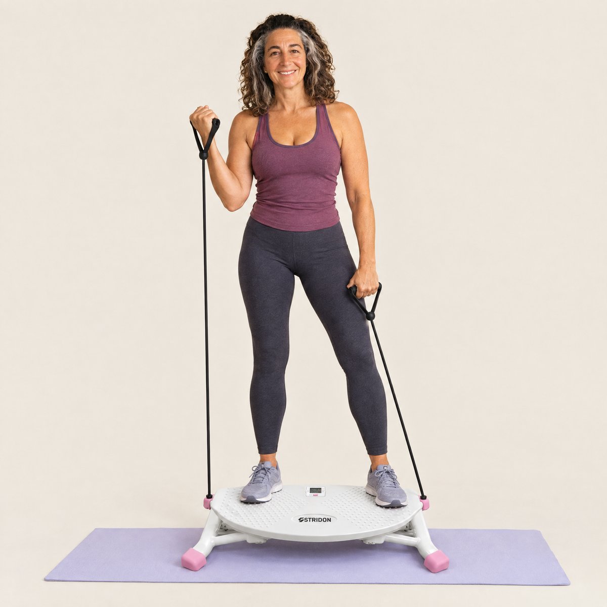 Jules standing on the Stridon All-Motion Trainer